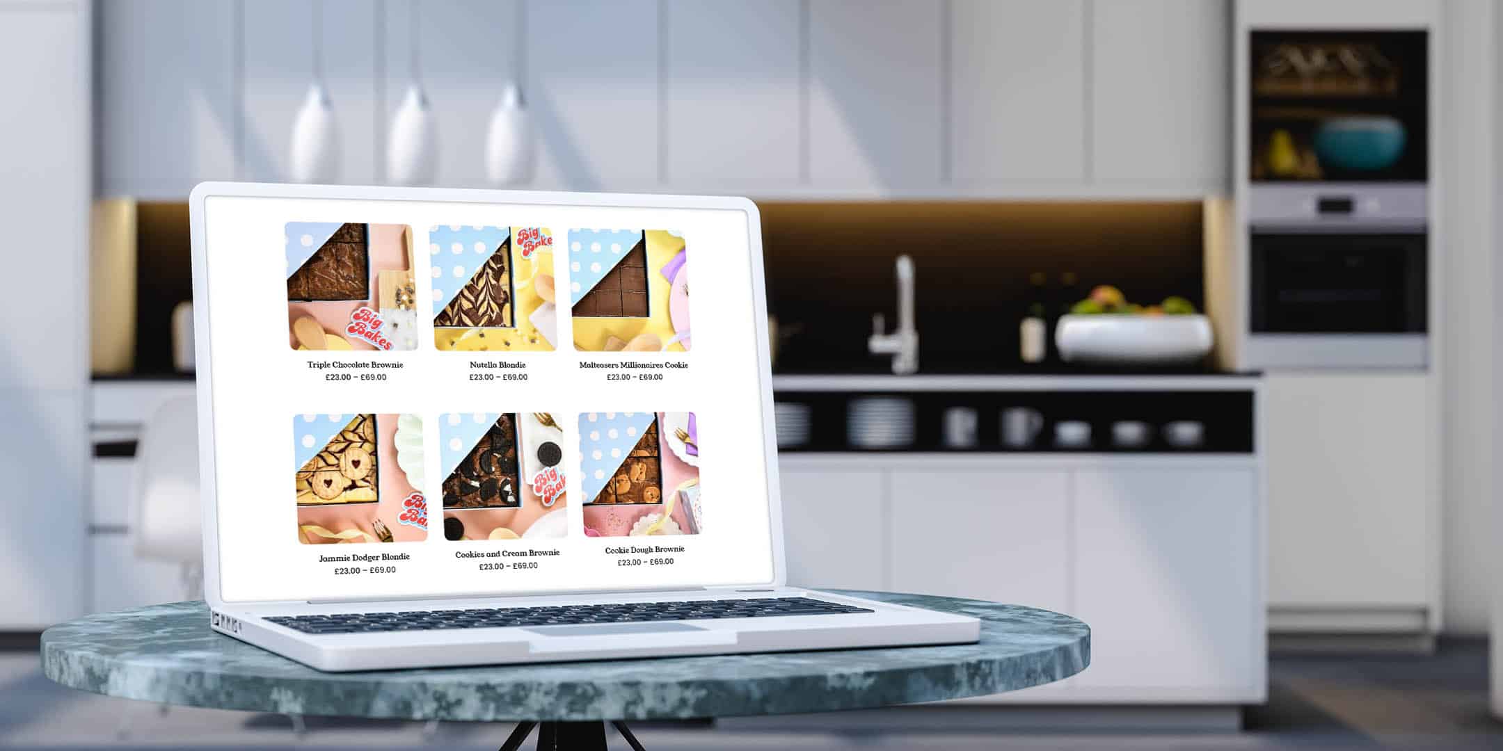 A laptop displaying the products section of the Big Bakes Bakery website