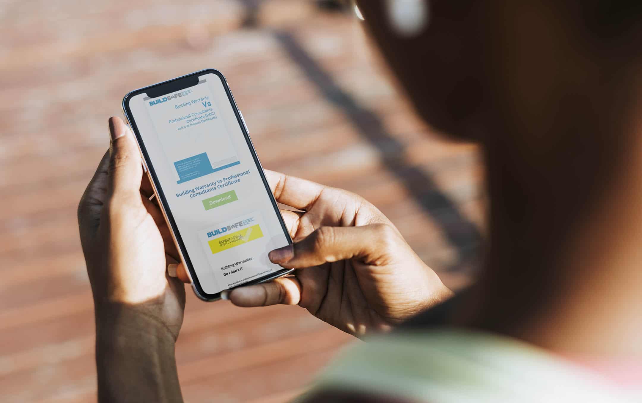 A smartphone showing the buildsafe website