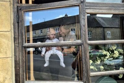 E-Innovate founder Karim with holding his baby at a Distilled Retreats location