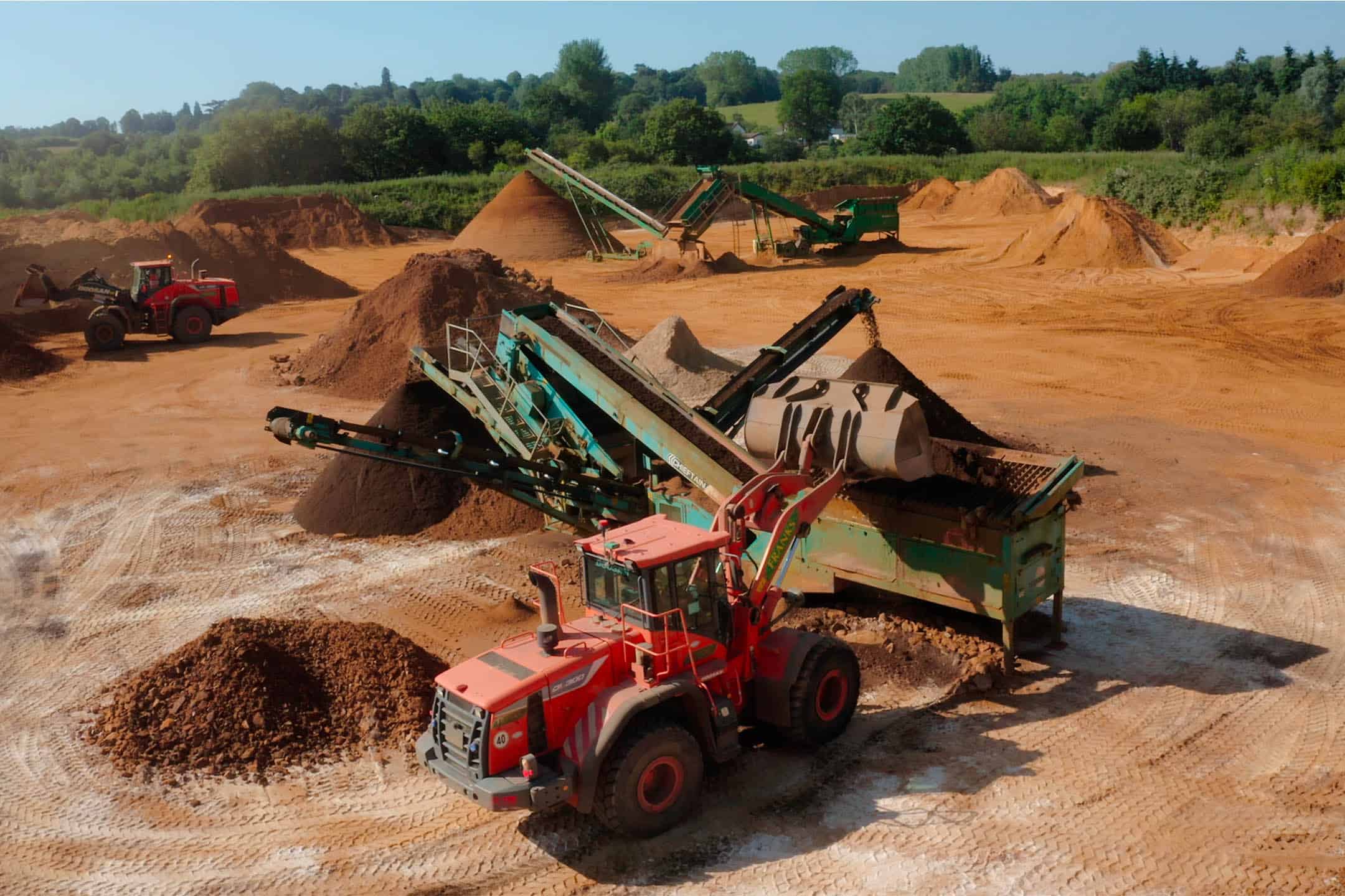 J&J Franks branded heavy machinery working at a quarry