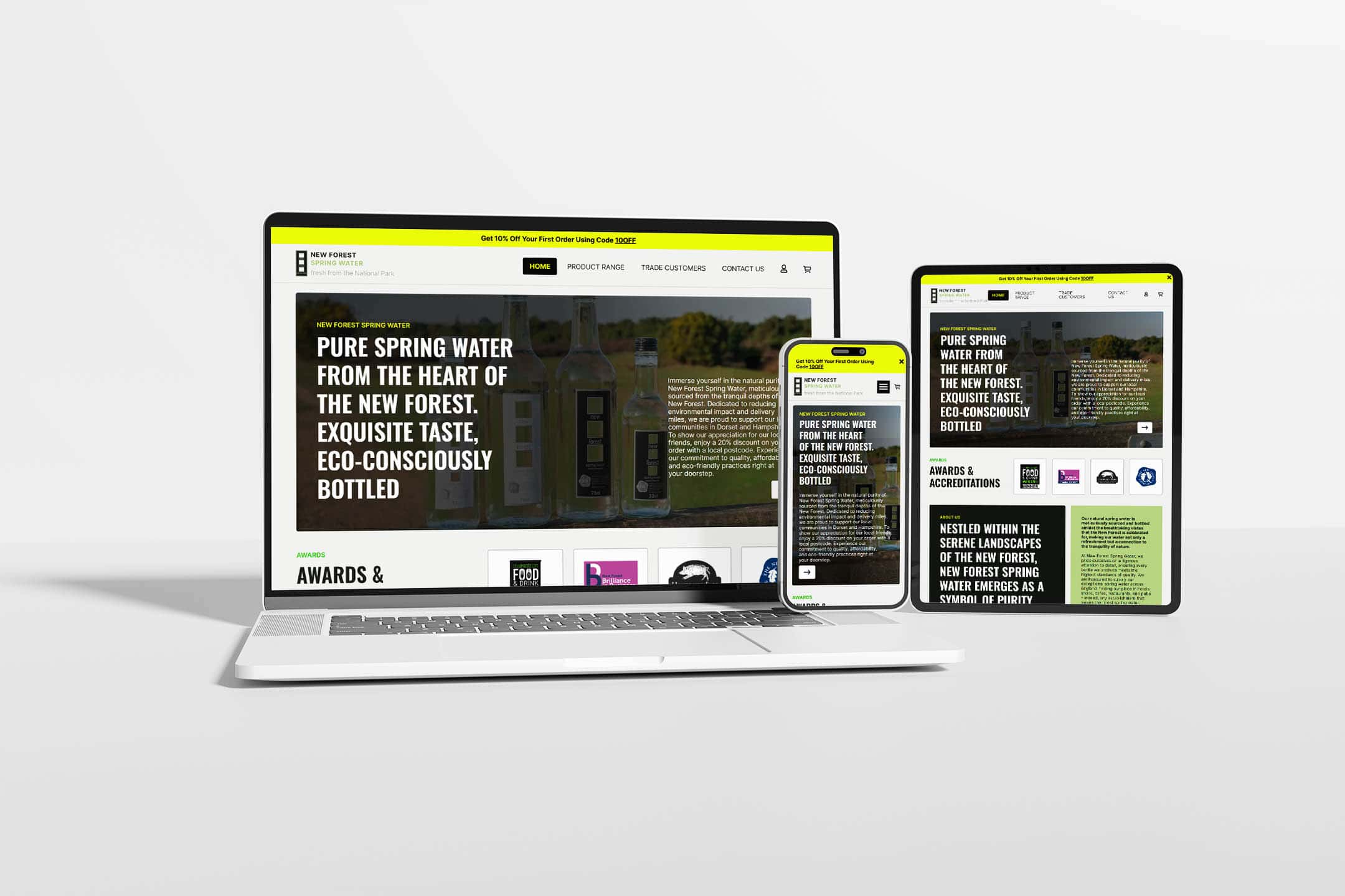 A laptop, smartphone, and tablet displaying the New Forest Water homepage