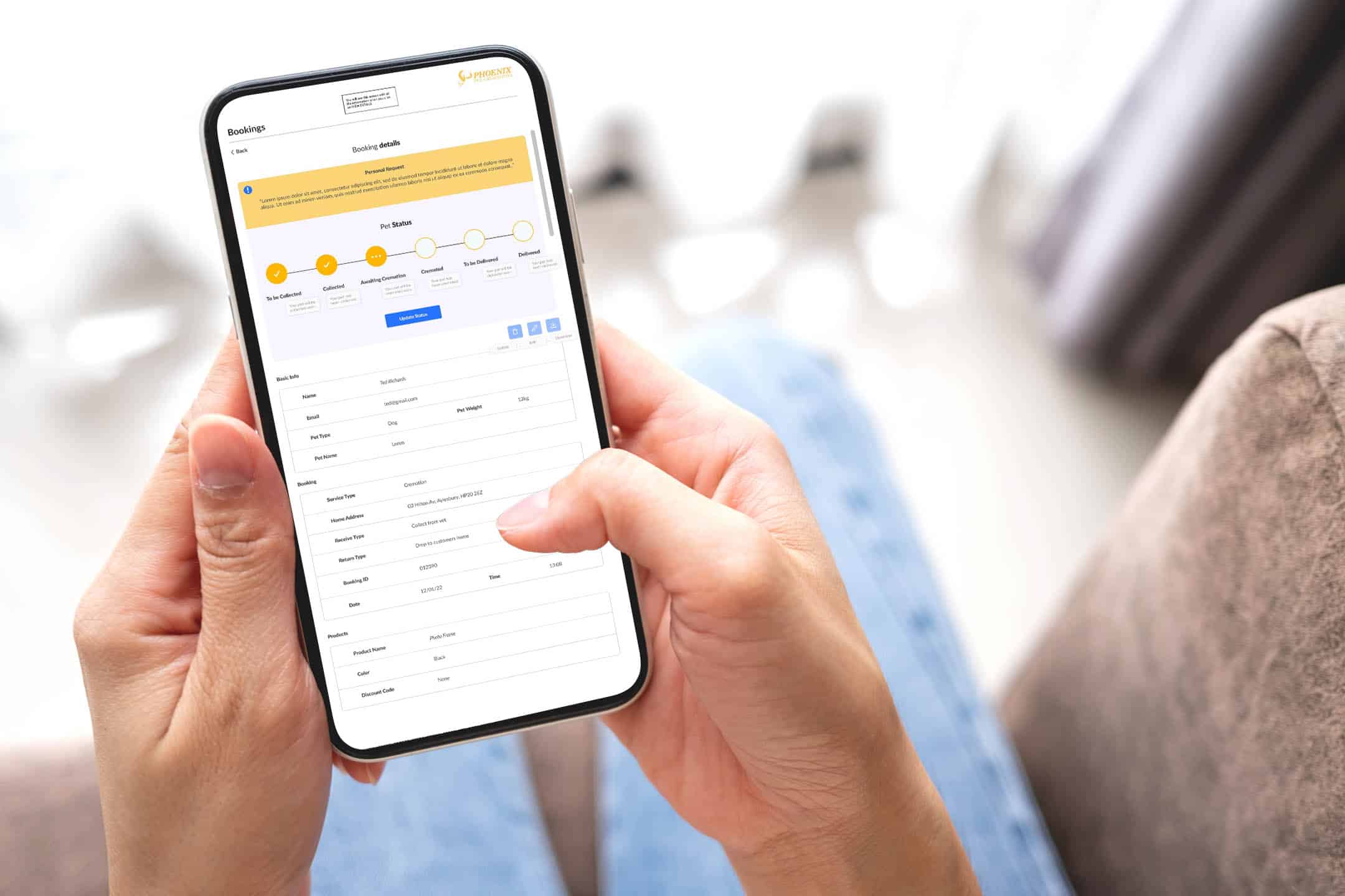 A smartphone displaying the Phoenix Pet Cremations booking page