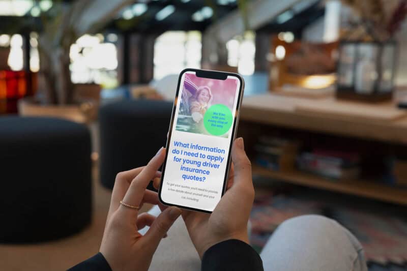 A smartphone user browsing the Young Car Driver website